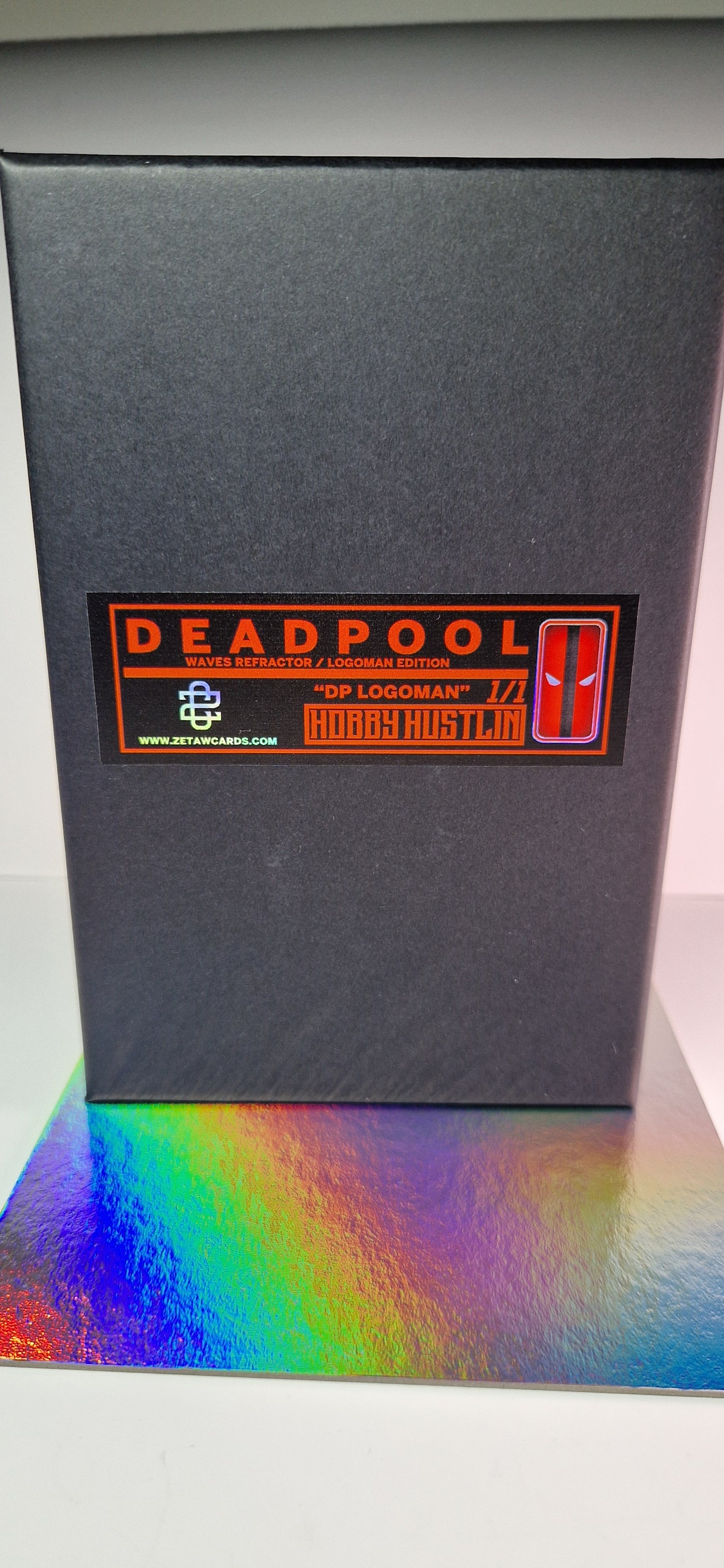 [1of1] DEADPOOL LOGOMAN - WAVES REFRACTOR
