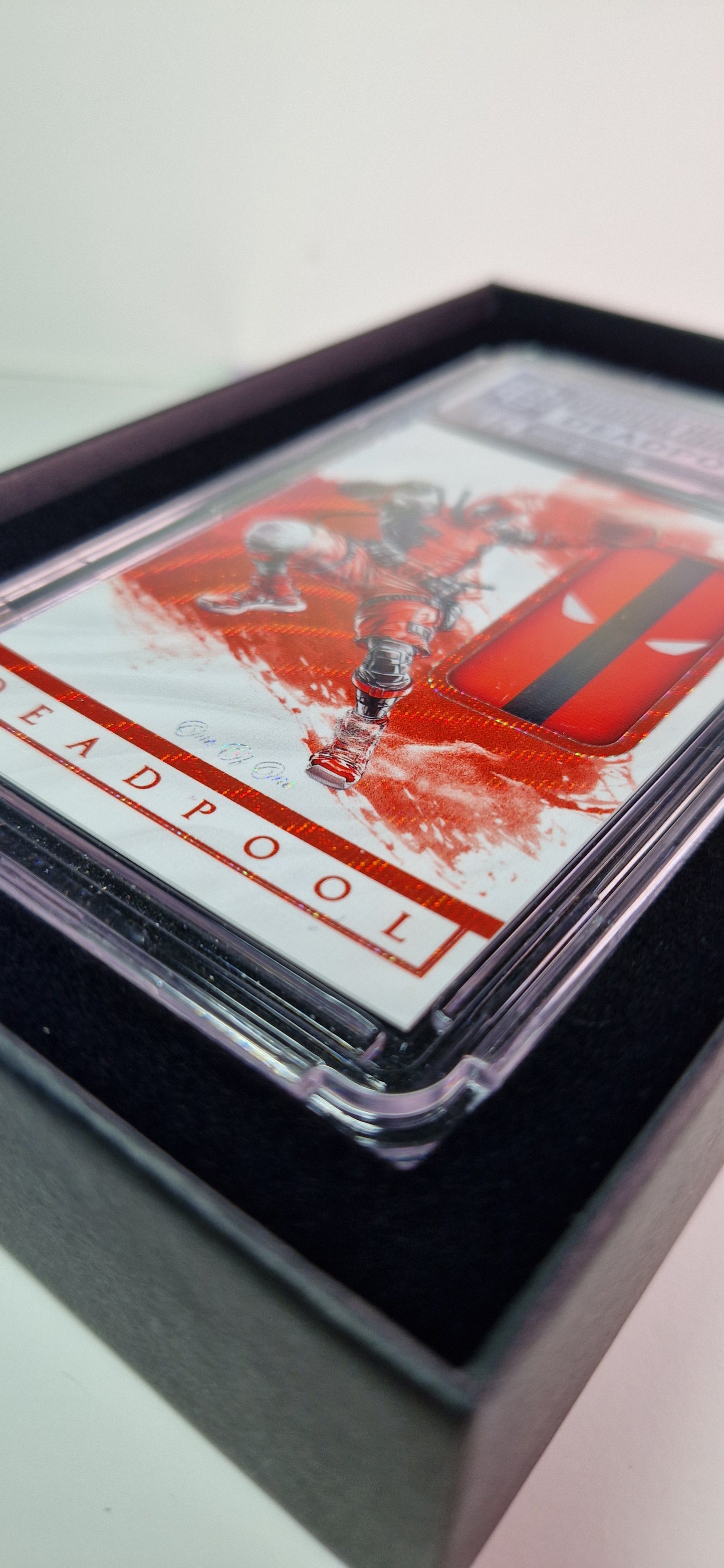 [1of1] DEADPOOL LOGOMAN - WAVES REFRACTOR